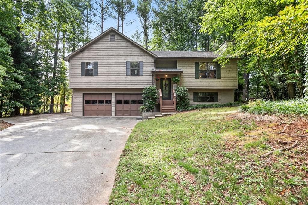 4 bedroom, 3 bathroom, 1,332 sq ft single family residence sold at 8040 SUMIT WOOD Drive, Kennesaw, GA 30152