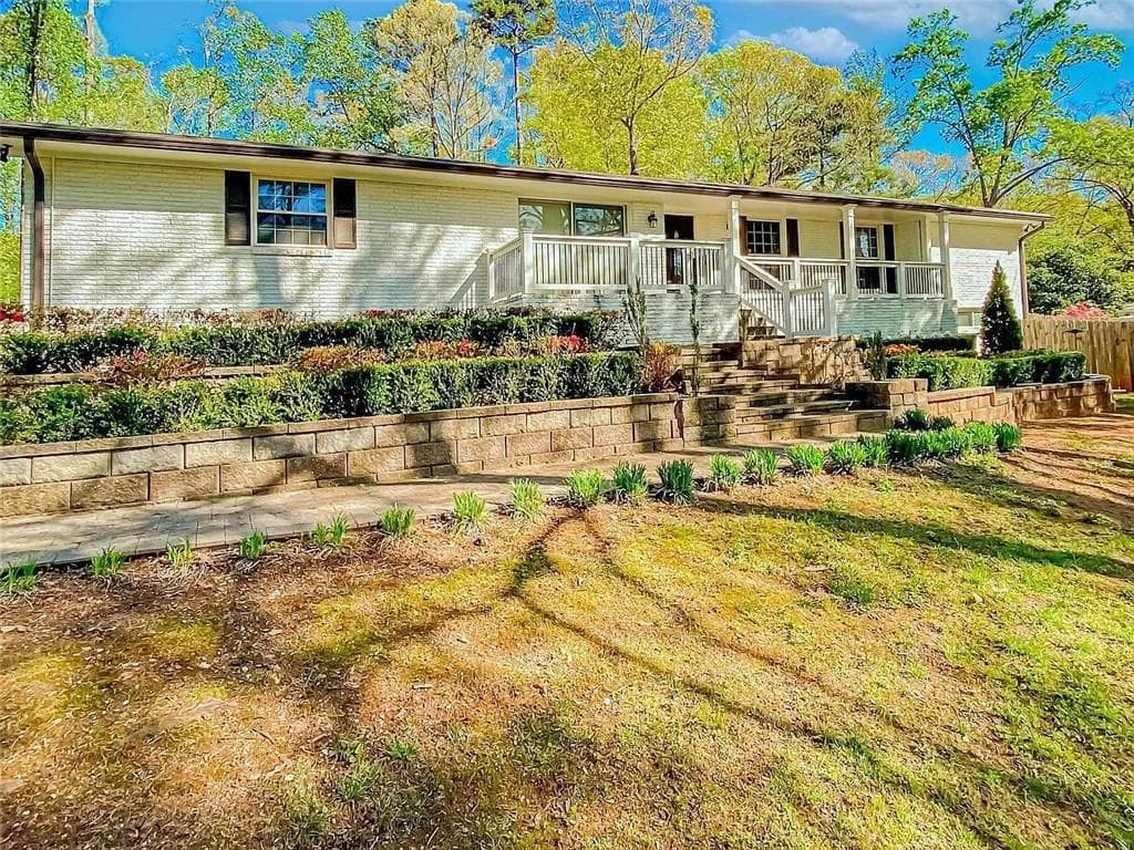 3 bedroom, 4 bathroom, 3,018 sq ft single family residence sold at 620 Spalding Drive, Sandy Springs, GA 30328
