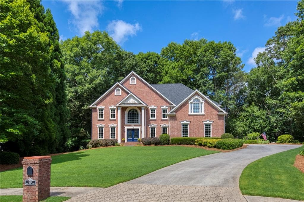 6 bedroom, 6 bathroom, 6,058 sq ft single family residence sold at 580 Fawn Glen Court, Roswell, GA 30075