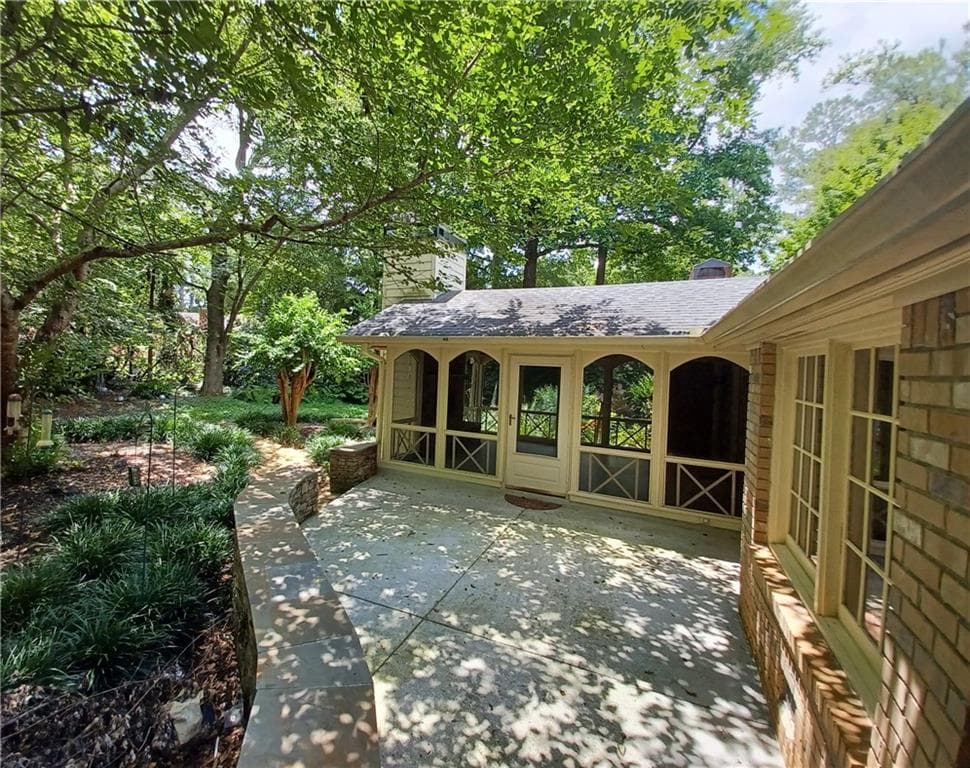 4 bedroom, 3 bathroom, 2,700 sq ft single family residence sold at 2113 Luray Court, Dunwoody, GA 30338