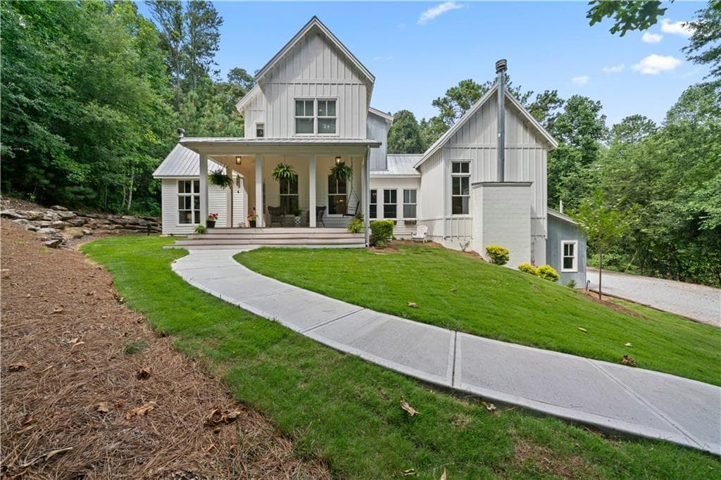 4 bedroom, 3 bathroom, 3,665 sq ft single family residence sold at 7445 Fox Hat Lane, Cumming, GA 30028