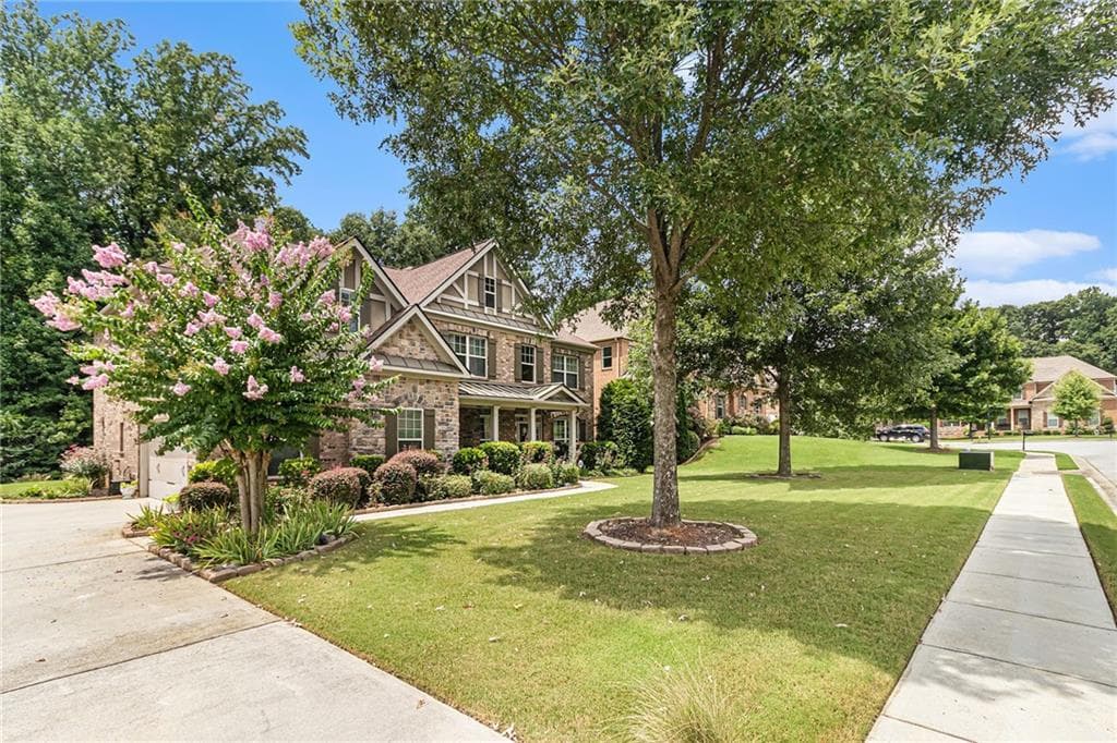 5 bedroom, 3 bathroom, 3,808 sq ft single family residence sold at 40 Village Green Court, Lilburn, GA 30047