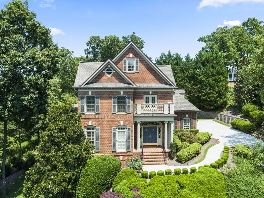 6 bedroom, 8 bathroom, 6,745 sq ft single family residence sold at 6240 Laurel Oak Drive, Suwanee, GA 30024