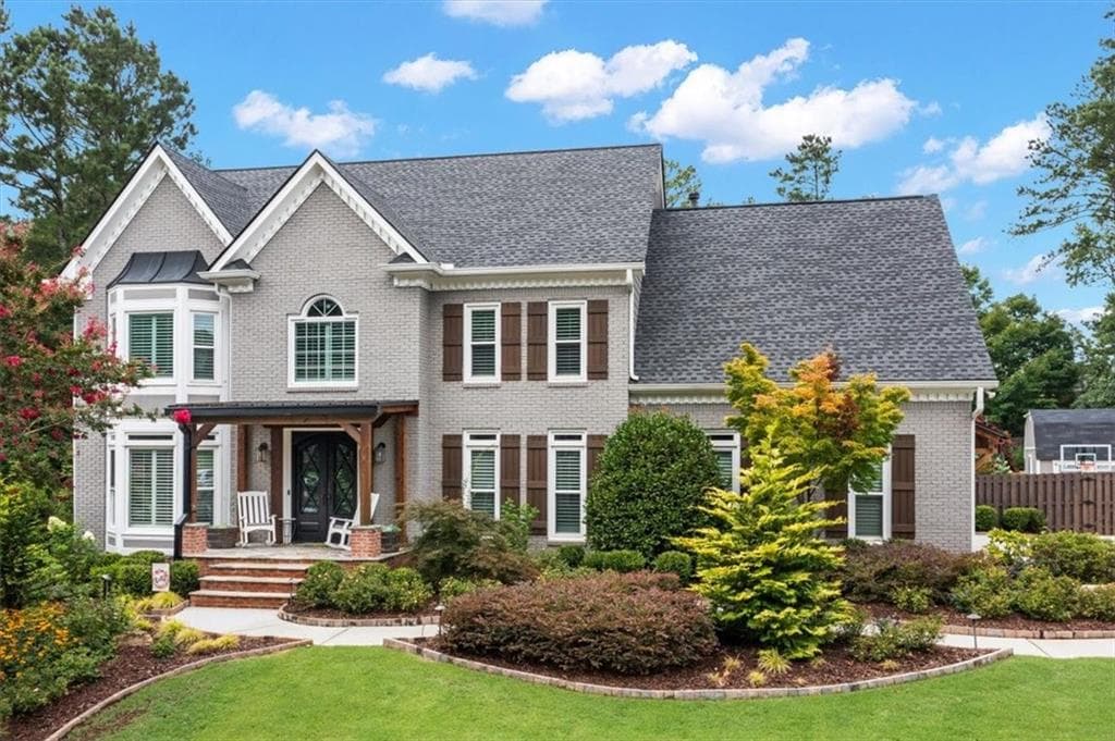 7 bedroom, 4 bathroom, 4,962 sq ft single family residence sold at 210 Woodbury Way, Alpharetta, GA 30022