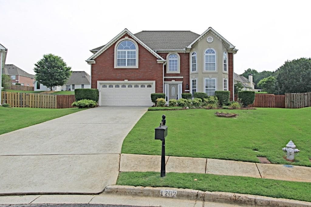4 bedroom single family residence sold at 1202 Marlton Chase Drive, Lawrenceville, GA 30044