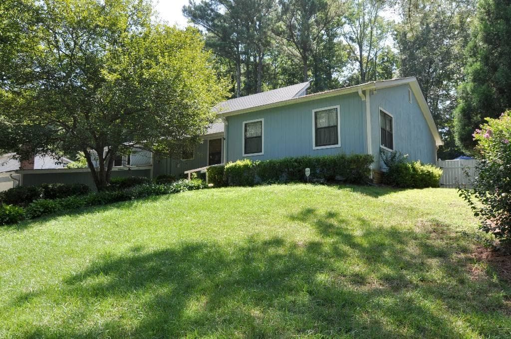 4 bedroom single family residence sold at 153 Newport Road, Lilburn, GA 30047