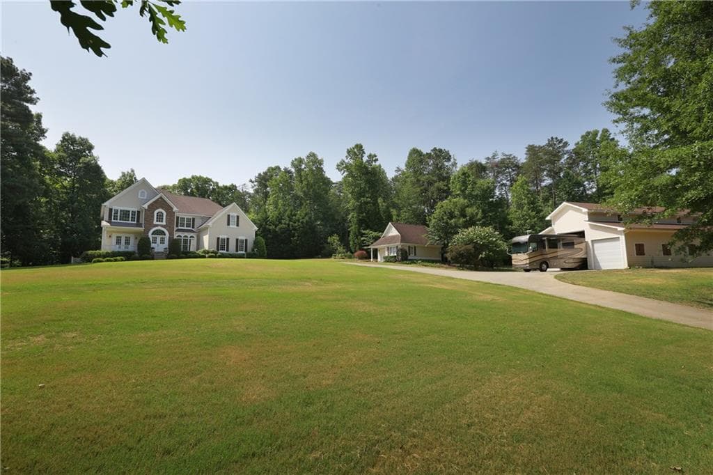 6 bedroom single family residence sold at 5070 ASCOT Drive, Cumming, GA 30028