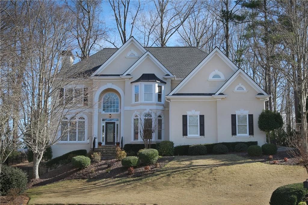 6 bedroom, 5,965 sq ft single family residence sold at 10425 High Falls Circle, Johns Creek, GA 30022