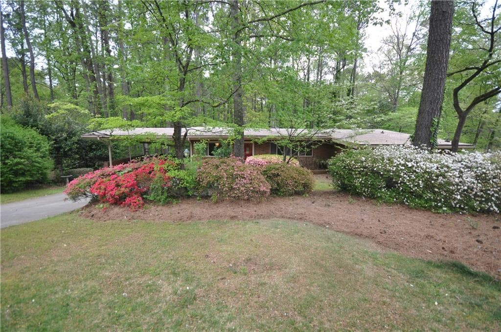 5 bedroom, 2,048 sq ft single family residence sold at 1703 Timberland Road, Atlanta, GA 30345
