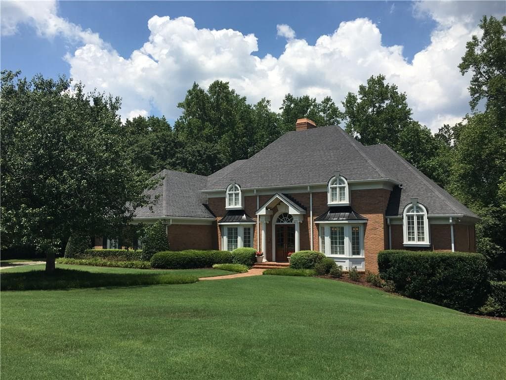 5 bedroom, 7,104 sq ft single family residence sold at 100 N Devereux Court, Atlanta, GA 30327