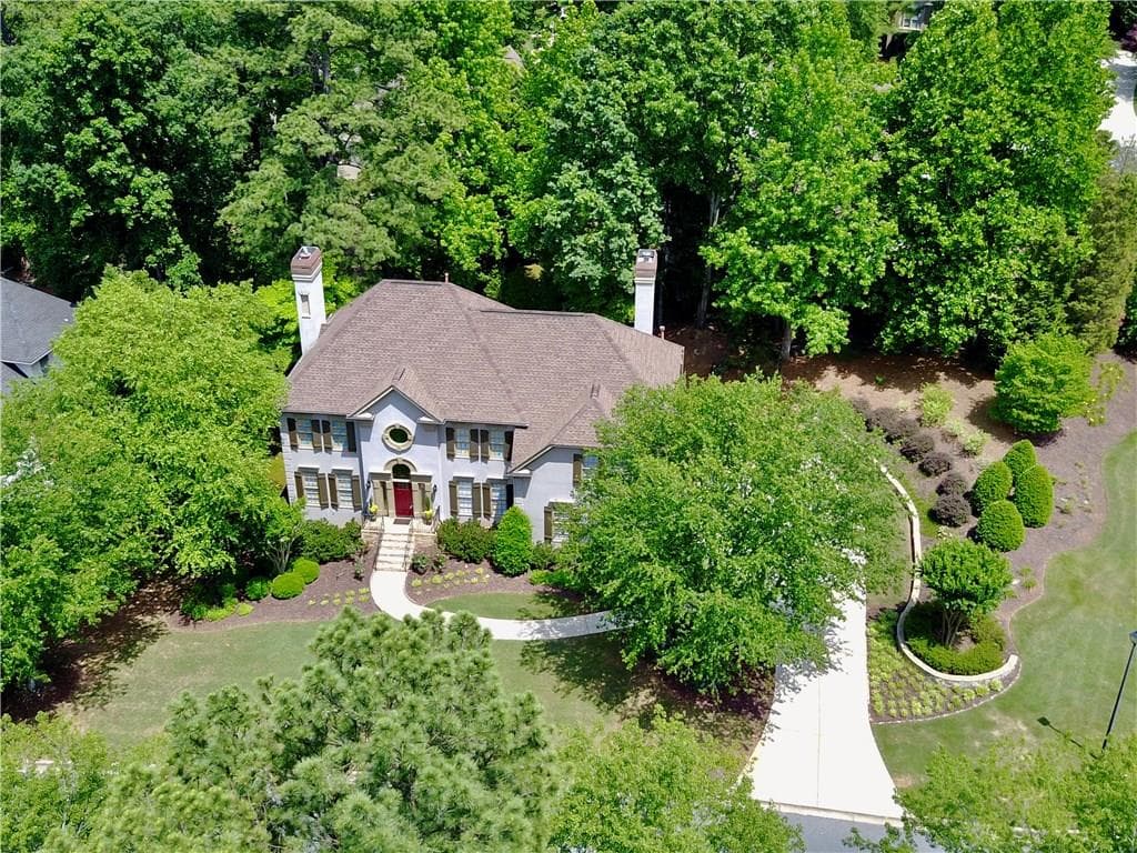 5 bedroom, 4,716 sq ft single family residence sold at 9605 Nesbit Lakes Drive, Alpharetta, GA 30022