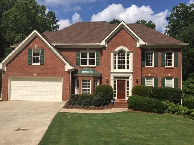 4 bedroom, 4,500 sq ft single family residence sold at 395 Wildwood Lake Court, Suwanee, GA 30024