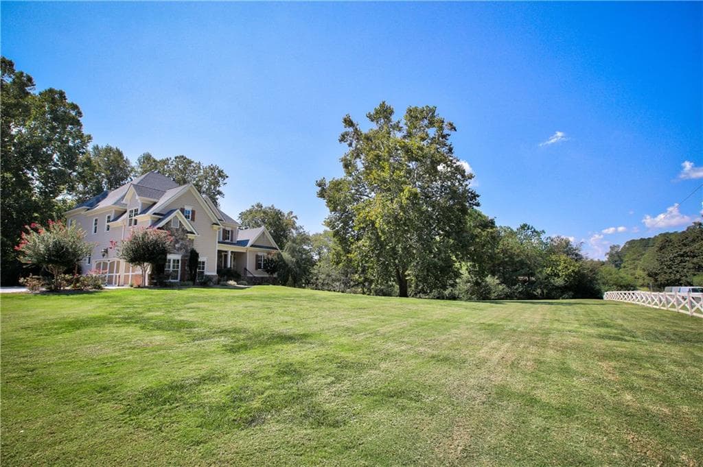 6 bedroom, 6,243 sq ft single family residence sold at 595 Dorris Road, Milton, GA 30004