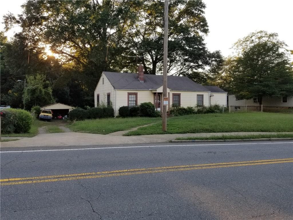 4 bedroom, 1,450 sq ft single family residence sold at 1244 Canton Street, Roswell, GA 30075
