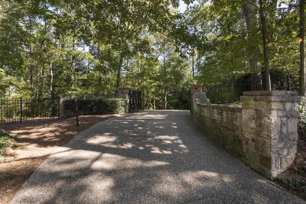7 bedroom, 11,630 sq ft single family residence sold at 714 W Conway Drive, Atlanta, GA 30327