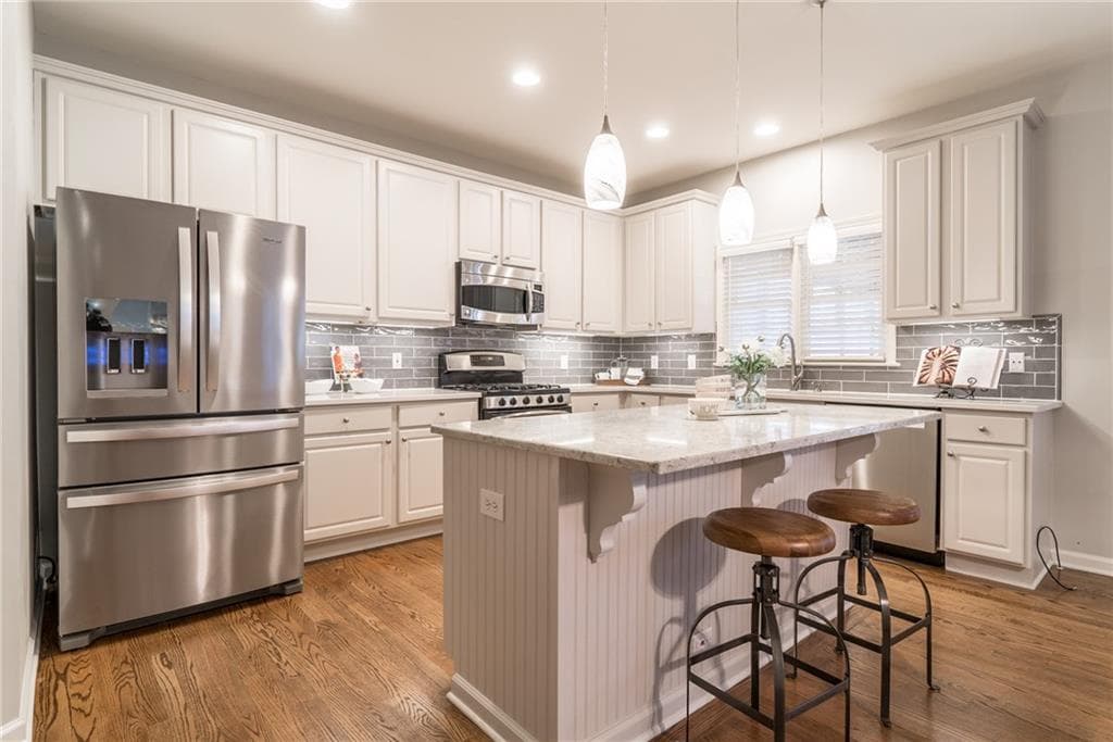4 bedroom, 3,418 sq ft single family residence sold at 780 River Cliff Court, Suwanee, GA 30024
