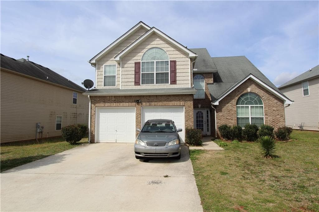 1909 Sawgrass Drive, Hampton, GA 30228 — most recent listing photo