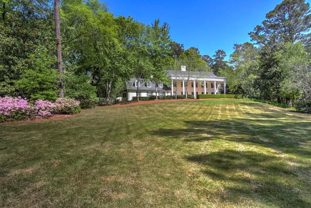 6 bedroom, 7,086 sq ft single family residence sold at 1665 W Wesley Road, Atlanta, GA 30327