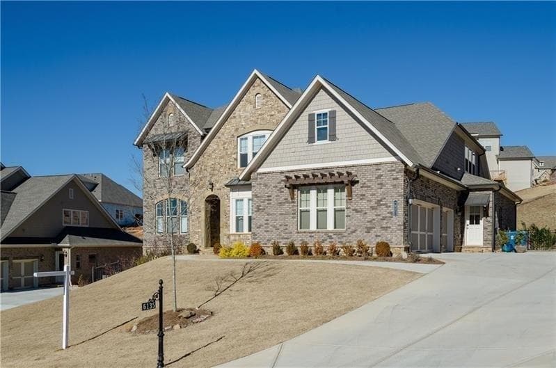 5 bedroom, 4,339 sq ft single family residence sold at 6135 Woodlawn Drive, Suwanee, GA 30024