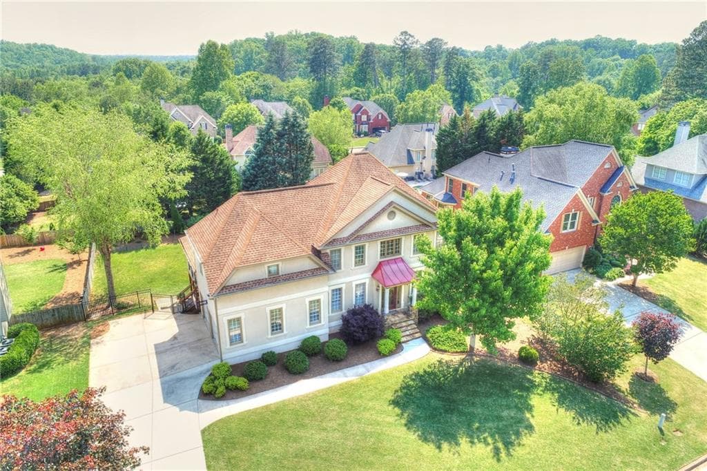 6 bedroom, 3,818 sq ft single family residence sold at 6710 Buckingham Circle, Cumming, GA 30040