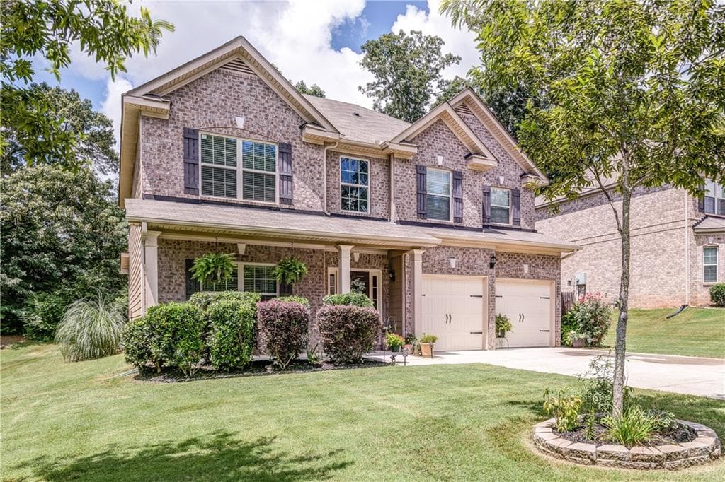 4 bedroom, 2,573 sq ft single family residence sold at 5075 Carriage Bridge Lane, Cumming, GA 30040