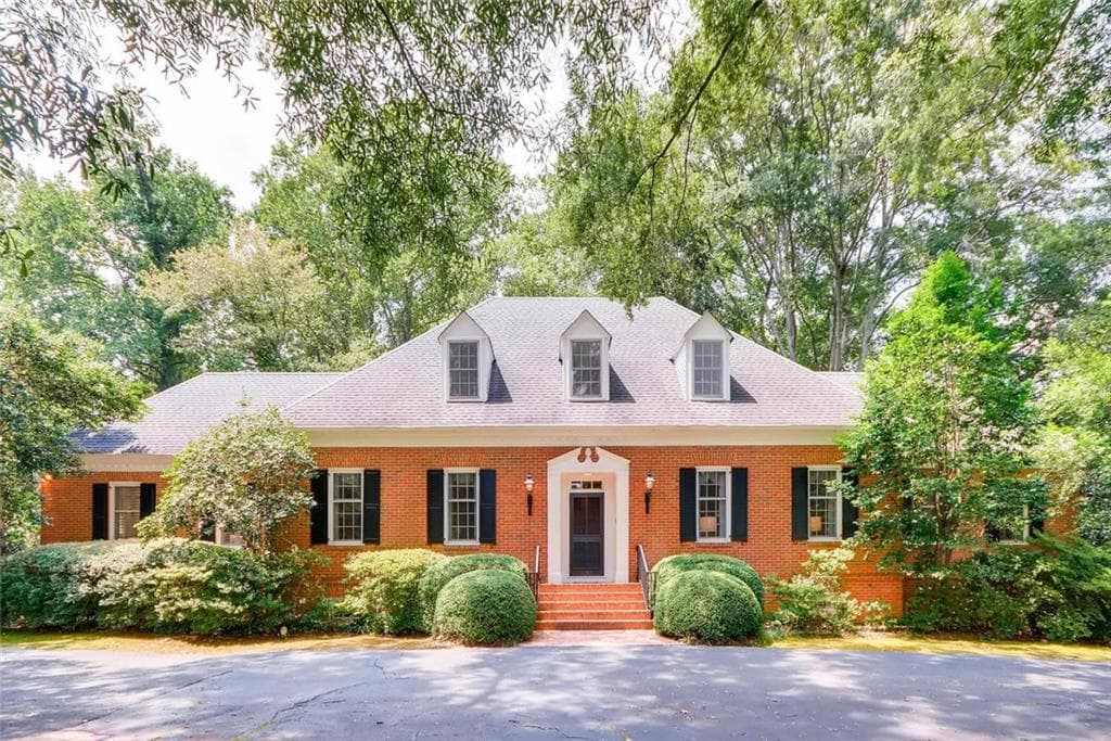 6 bedroom, 5,641 sq ft single family residence sold at 1052 Castle Falls Drive, Atlanta, GA 30329