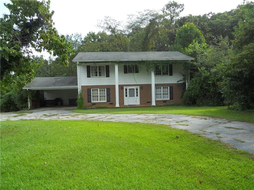 4 bedroom single family residence sold at 3873 Chamblee Dunwoody Road, Chamblee, GA 30341