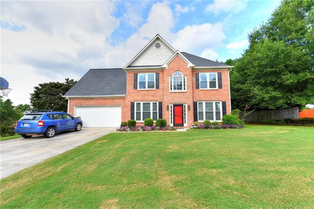 4 bedroom, 2,300 sq ft single family residence sold at 1445 Windsong Park Drive, Dacula, GA 30019