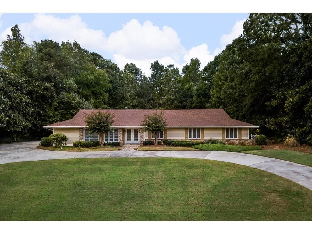 5 bedroom, 4,950 sq ft single family residence sold at 8025 Monticello Drive, Atlanta, GA 30350