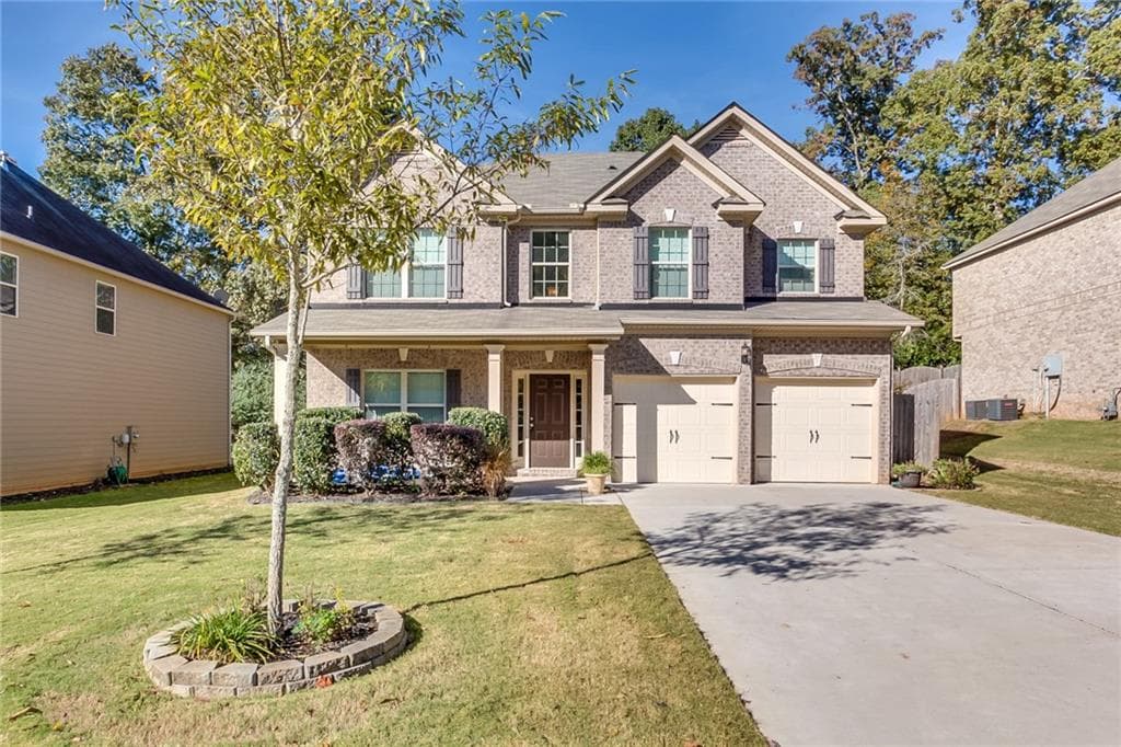 4 bedroom, 2,573 sq ft single family residence sold at 5075 Carriage Bridge Lane, Cumming, GA 30040