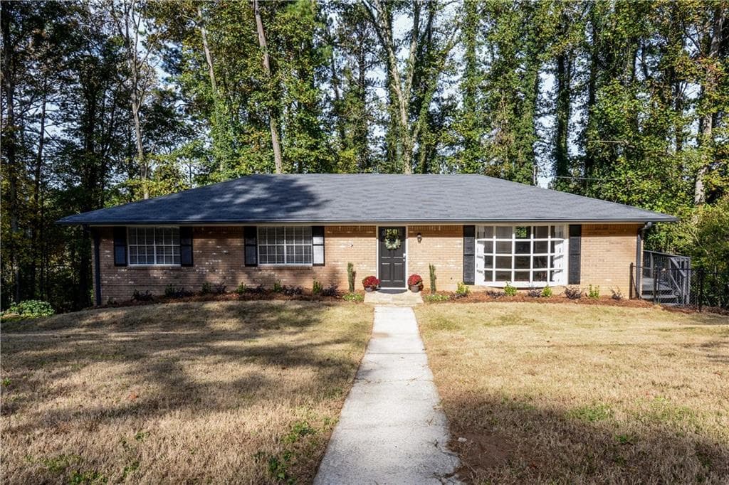 3 bedroom, 1,874 sq ft single family residence sold at 1228 Woodleigh Road, Marietta, GA 30008