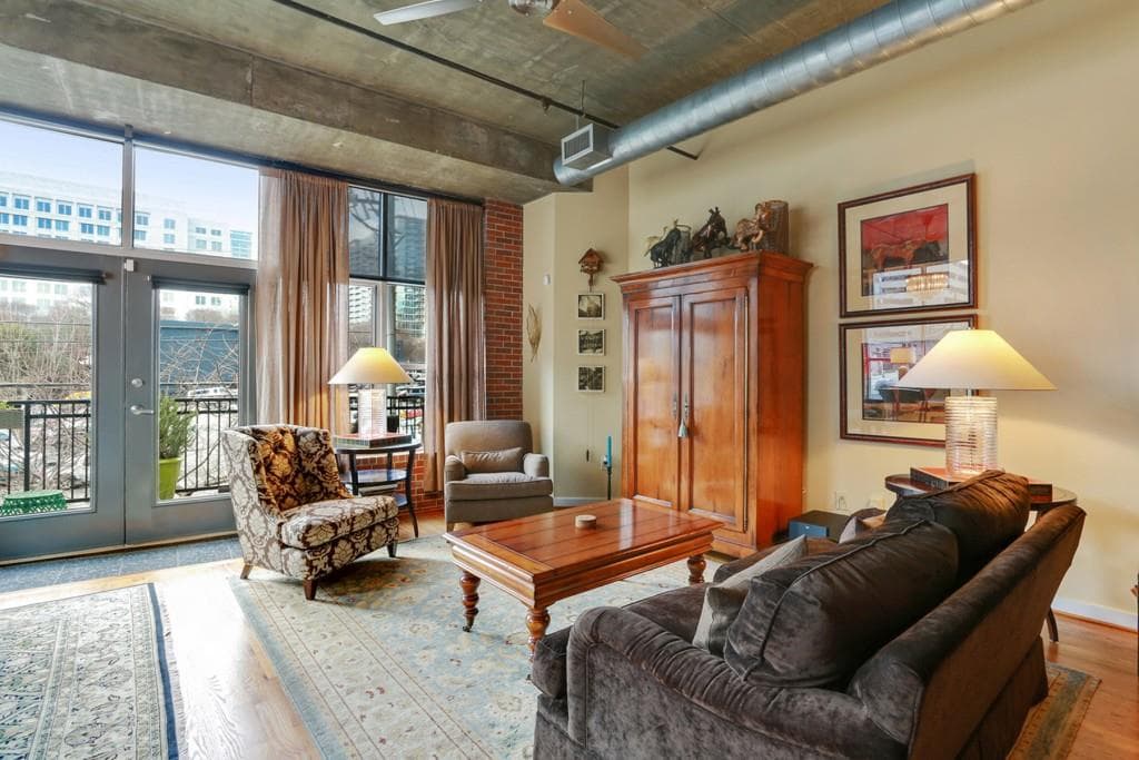 1 bedroom, 1,068 sq ft condominium sold at 1023 Juniper Street 201, Atlanta, GA 30309